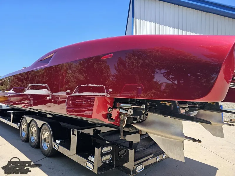 Slide: The Image of Red MTI 44 Corvette boat detail against blue sky, 2010 model. - 14