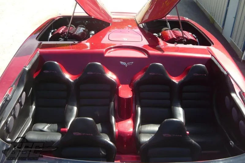 Slide: The Image of 2010 MTI 44 Corvette boat on trailer under clear blue sky. - 28