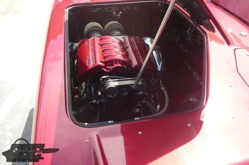 Slide: The Image of 2010 MTI 44 Corvette boat with ZR1 emblem under clear blue sky. - 29