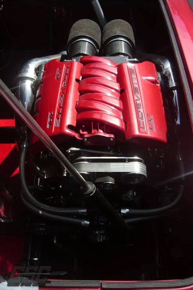 Slide: The Image of Rear view of a 2010 MTI 44 Corvette boat with visible propeller and exhaust. - 32