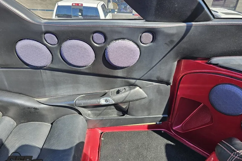 Slide: The Image of Interior of a 2010 MTI 44 Corvette with custom speaker setup. - 84