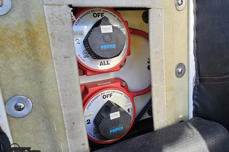 Slide: The Image of Battery switches on a 2010 MTI 44 Corvette boat, featuring Perko controls. - 86
