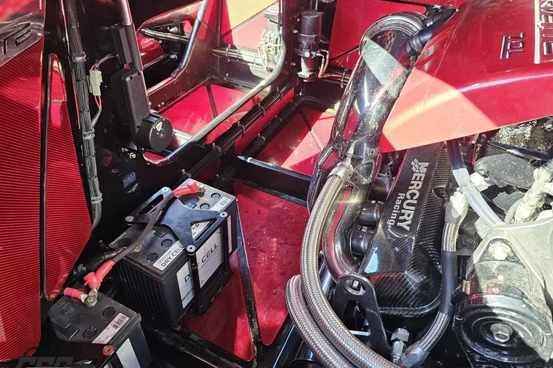 Slide: The Image of Engine compartment of a 2010 MTI 44 Corvette with Mercury Racing components. - 99