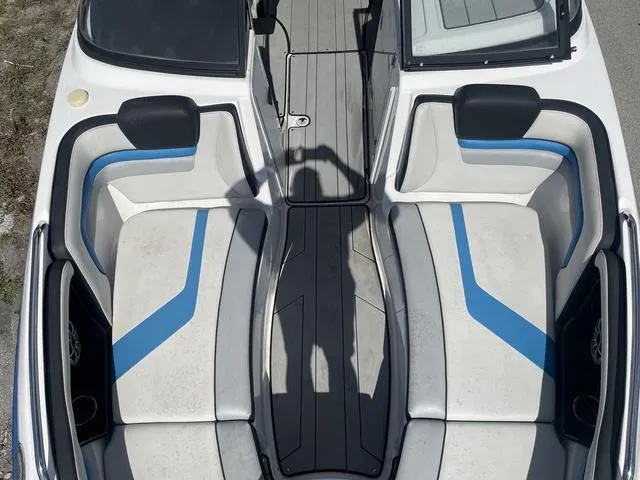 Slide: The Image of 2020 Yamaha Boats 242X interior seating and deck view. - 12
