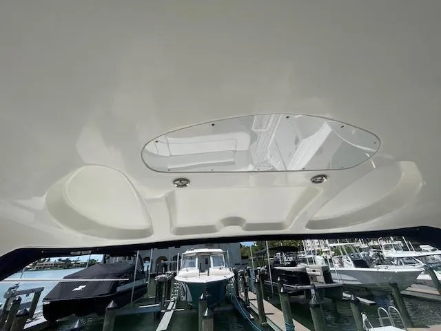 Slide: The Image of 2005 Sea Ray 390 Sundancer boat interior ceiling view at marina. - 18