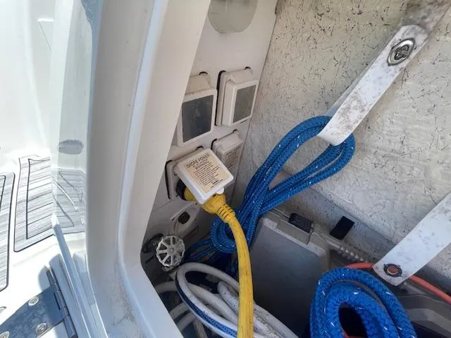 Slide: The Image of Electrical connections and ropes on a 2005 Sea Ray 390 Sundancer boat. - 8