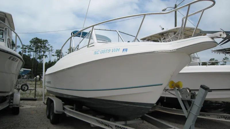 The Image of Aquasport 225 EXPLORER/ w/2020 DF200ATX2 SUZUKI FOURSTROKE 1999 - 1