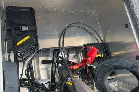 Slide: The Image of 2024 Crestliner 1600 Storm boat wiring and battery compartment. - 14