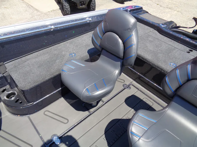 Slide: The Image of 2024 Nitro ZV21 boat interior with gray and blue seats. - 10