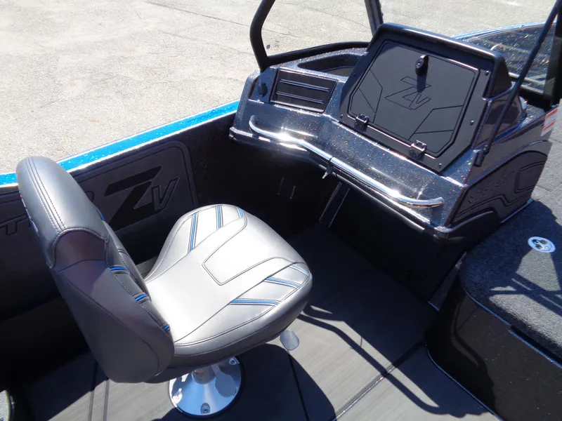 Slide: The Image of 2024 Nitro ZV21 boat interior with captain's chair and control console. - 12