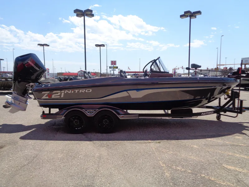 Slide: The Image of 2024 Nitro ZV21 boat on trailer in outdoor lot. - 3
