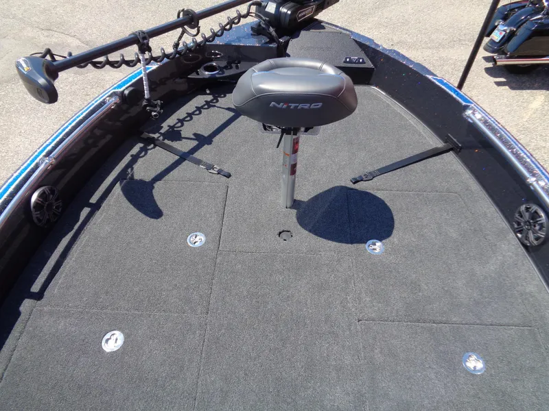 Slide: The Image of 2024 Nitro ZV21 boat deck with seat and fishing equipment. - 8