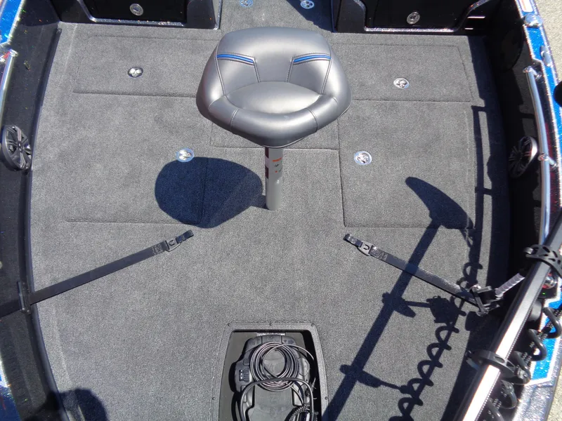 Slide: The Image of 2024 Nitro ZV21 boat deck with a single seat and storage compartments. - 9