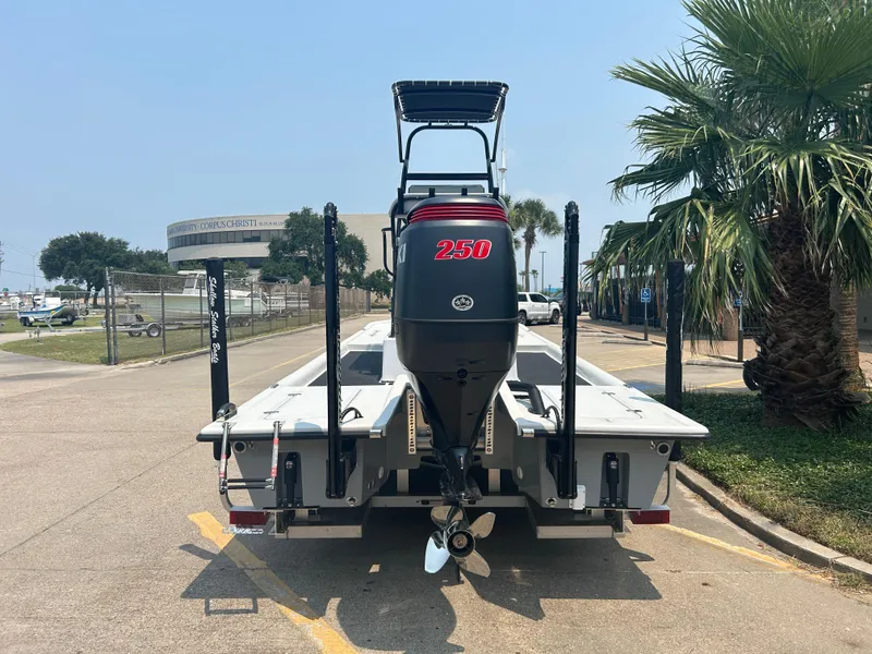 Slide: The Image of 2025 Shallow Stalker 240 RC Elite boat with 250 HP engine, rear view. - 5