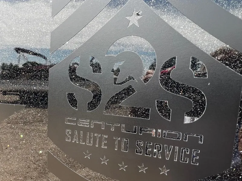 Slide: The Image of Centurion Ri245 2021 S2S Salute to Service logo on glittery surface. - 2