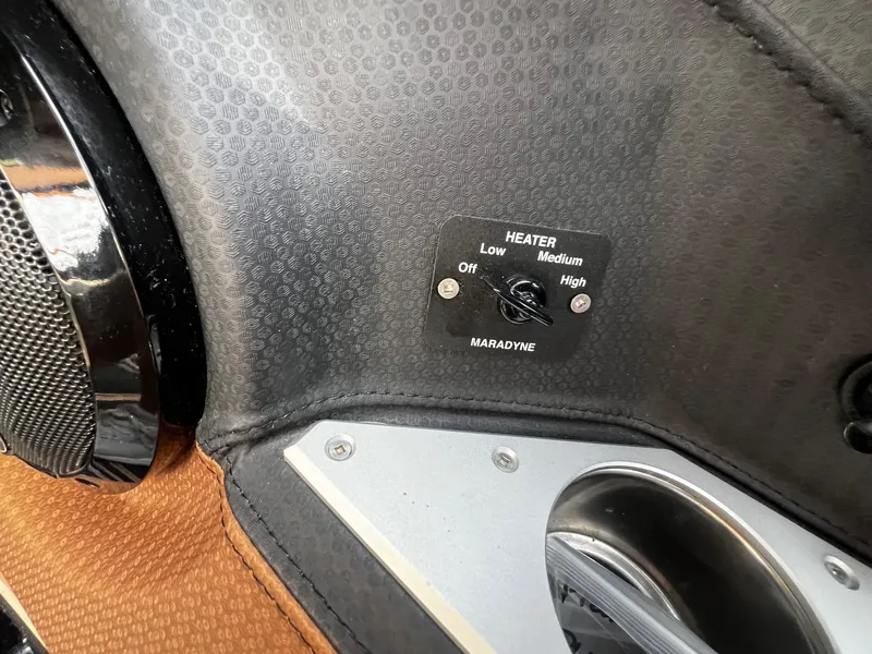 Slide: The Image of Centurion Ri245 2021 boat heater control panel with Maradyne switch. - 22