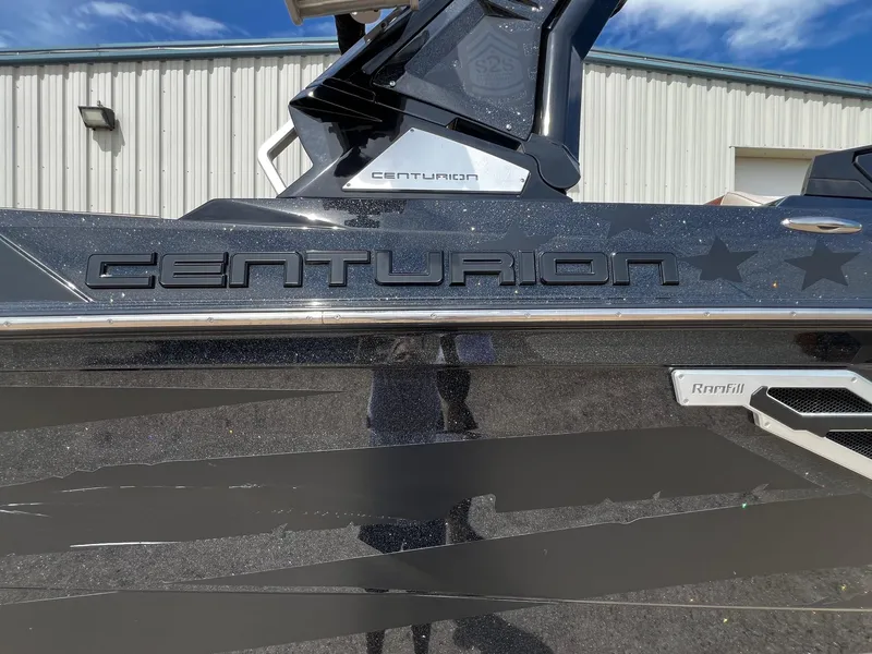 Slide: The Image of 2021 Centurion Ri245 boat side view with logo and RamFill feature. - 3