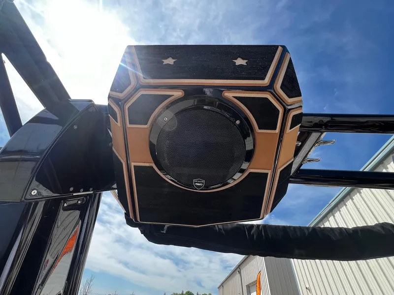 Slide: The Image of Centurion Ri245 2021 boat speaker system under a clear blue sky. - 32