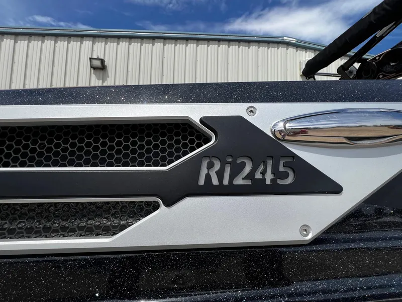 Slide: The Image of Close-up of 2021 Centurion Ri245 boat model badge. - 4