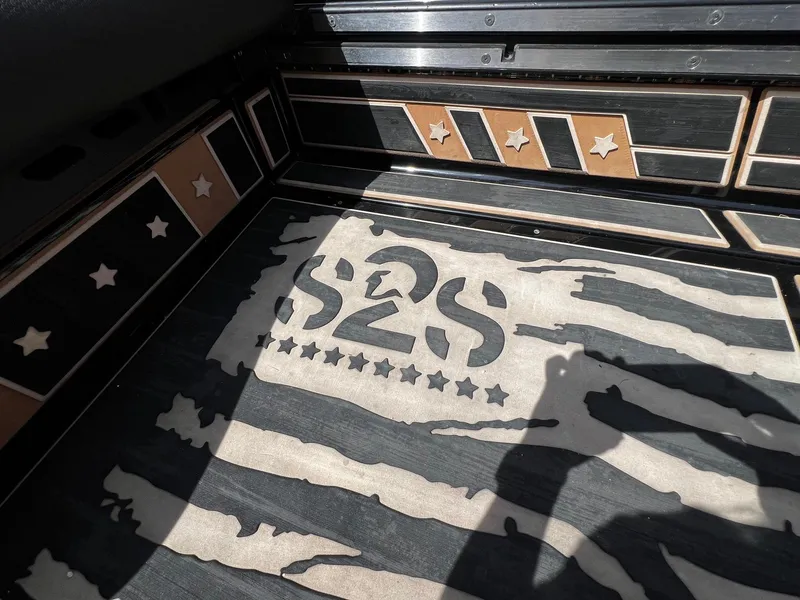Slide: The Image of Centurion Ri245 2021 boat interior with custom star and stripe design. - 43