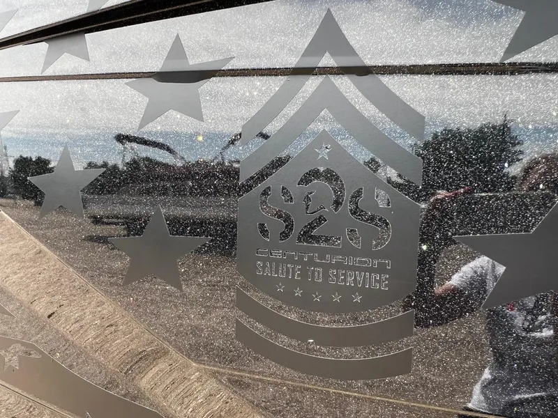 Slide: The Image of 2021 Centurion Ri245 Salute to Service decal with stars and military insignia. - 47