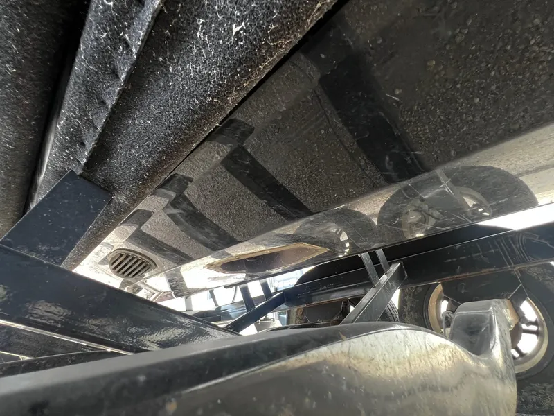 Slide: The Image of Underside view of a 2021 Centurion Ri245 boat on a trailer. - 48