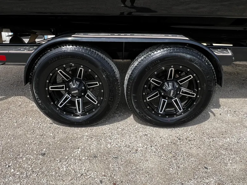 Slide: The Image of 2021 Centurion Ri245 trailer with black alloy wheels and Gladiator tires. - 49