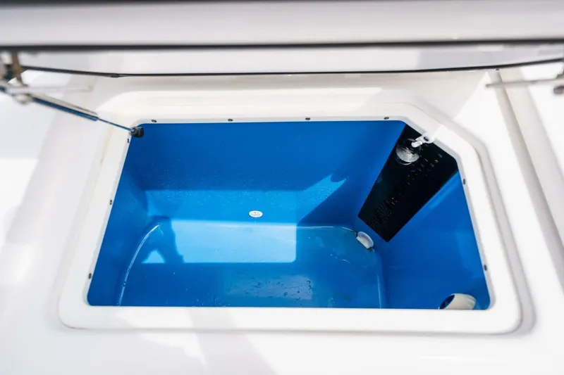 Slide: The Image of 2019 Everglades 435 Center Console livewell compartment. - 29