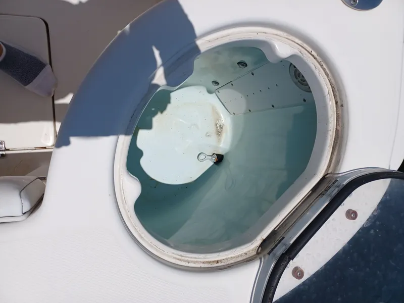 Slide: The Image of Livewell on a 2016 Robalo R300 Center Console boat. - 21
