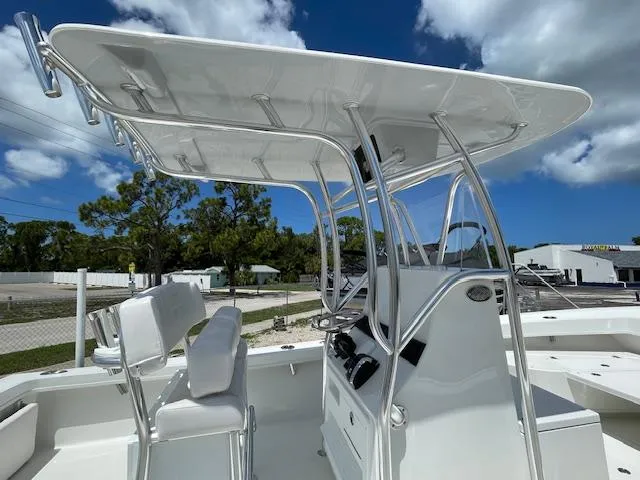 Slide: The Image of 2025 Pair Customs 21MV boat with T-top and dual helm seats. - 10