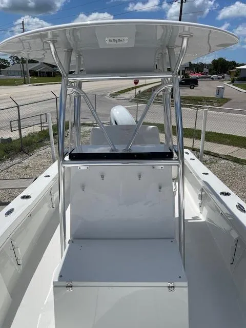 Slide: The Image of 2025 Pair Customs 21MV boat with T-top and center console. - 24