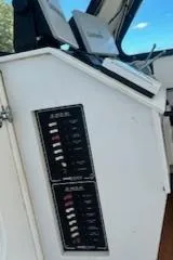 Slide: The Image of Control panel of a 1989 Markley 35 Ft. Deadrise boat cockpit. - 22