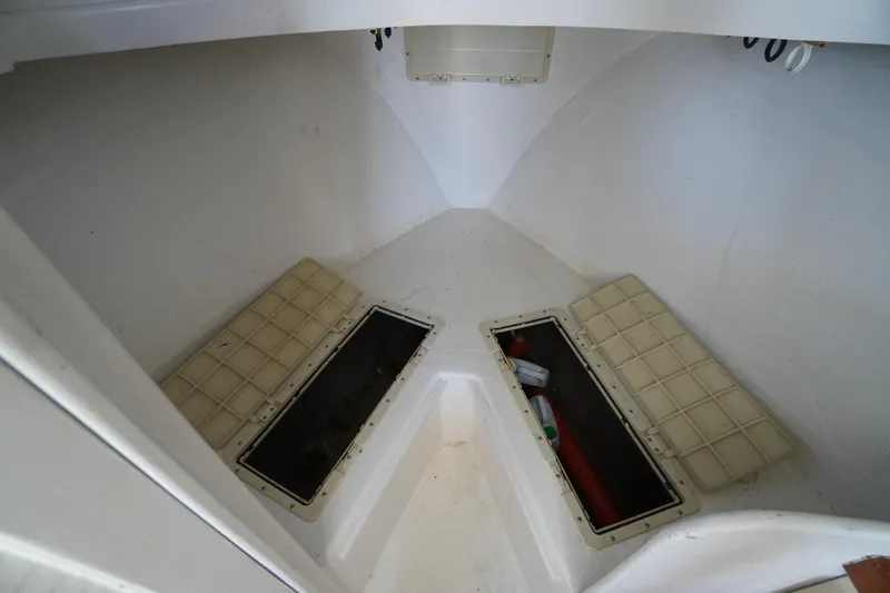 Slide: The Image of Interior of 1989 Markley 35 Ft. Deadrise boat with storage compartments. - 32