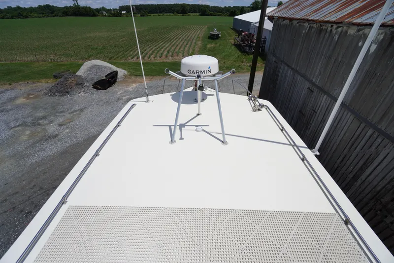 Slide: The Image of Rooftop view of 1989 Markley 35 Ft. Deadrise boat with Garmin radar. - 69