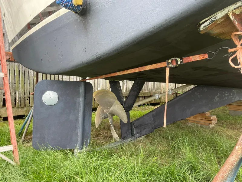 Slide: The Image of 1998 Markley 35 Ft. Deadrise boat hull and propeller on dry dock. - 9