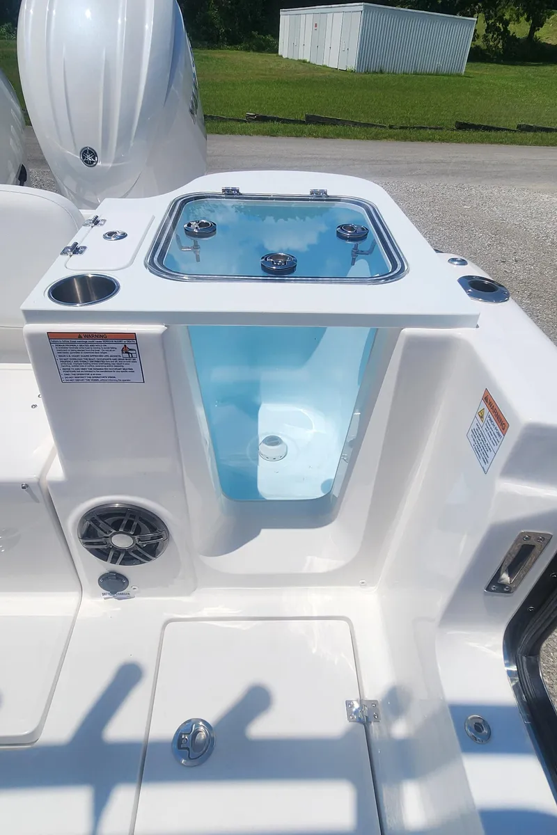 Slide: The Image of 2025 Sea Fox 268 Commander boat livewell and storage area. - 10