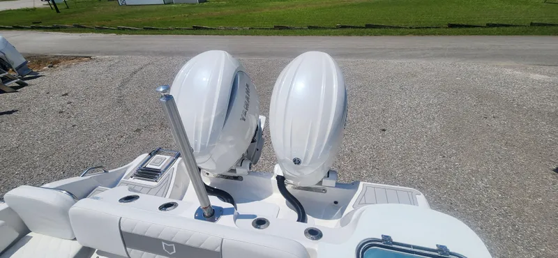Slide: The Image of 2025 Sea Fox 268 Commander boat with dual outboard engines. - 11