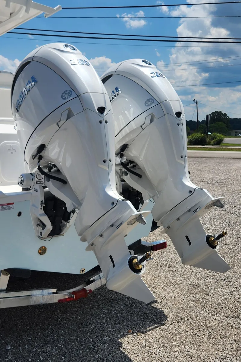 Slide: The Image of Twin outboard engines on a 2025 Sea Fox 268 Commander boat. - 12
