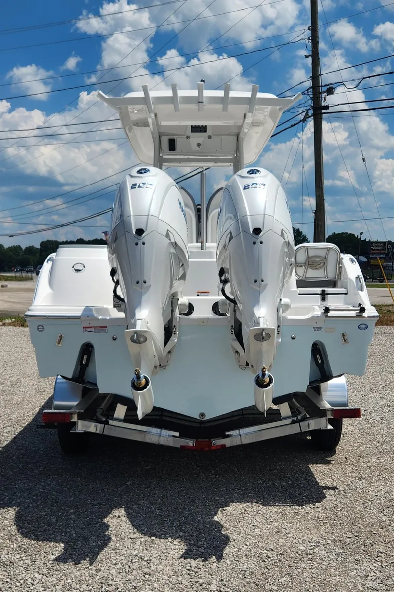 Slide: The Image of 2025 Sea Fox 268 Commander with twin outboard engines, rear view. - 2