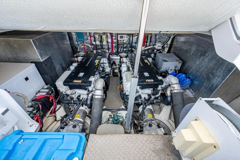 Slide: The Image of Engine room of a 2015 Regal 46 Sport Coupe yacht with twin engines. - 23
