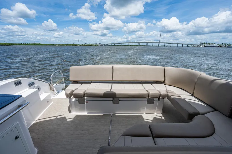 Slide: The Image of 2015 Regal 46 Sport Coupe boat interior with scenic water view. - 28