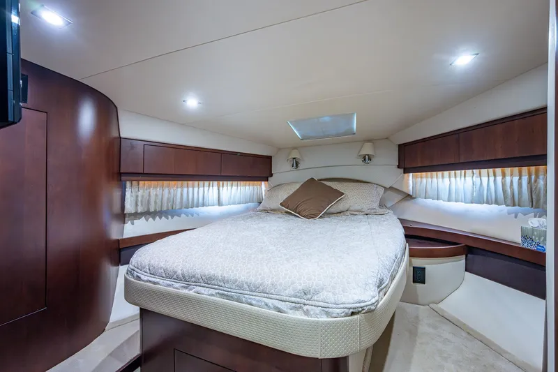 Slide: The Image of Luxurious bedroom interior of 2015 Regal 46 Sport Coupe yacht with modern lighting. - 44