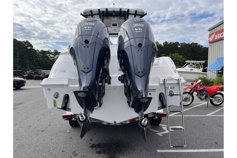 Slide: The Image of 2025 Sea Fox 288 Commander with twin 300 HP engines, rear view. - 4