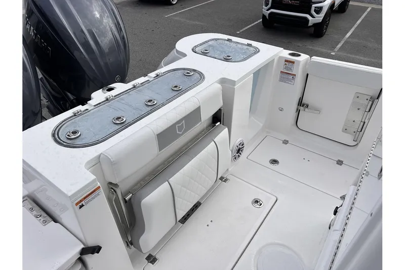 Slide: The Image of 2025 Sea Fox 288 Commander boat interior with foldable seat and storage compartments. - 7