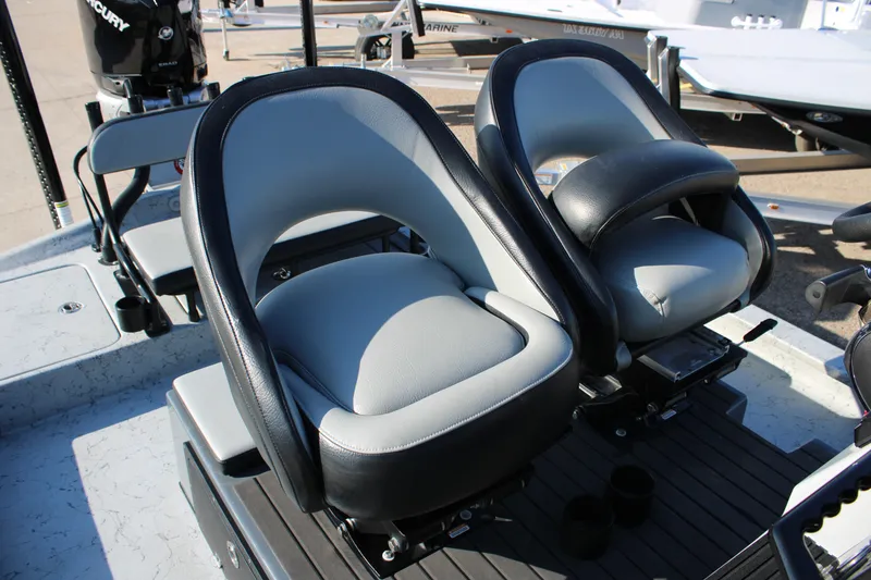 Slide: The Image of Two comfortable seats on a 2025 Mamba 23 Cat Classic boat. - 11