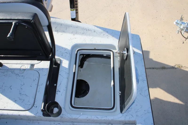 Slide: The Image of Open storage compartment on 2025 Mamba 23 Cat Classic boat deck. - 14