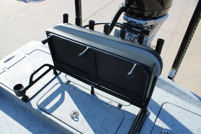 Slide: The Image of 2025 Mamba 23 Cat Classic boat seat and rod holders on deck. - 15