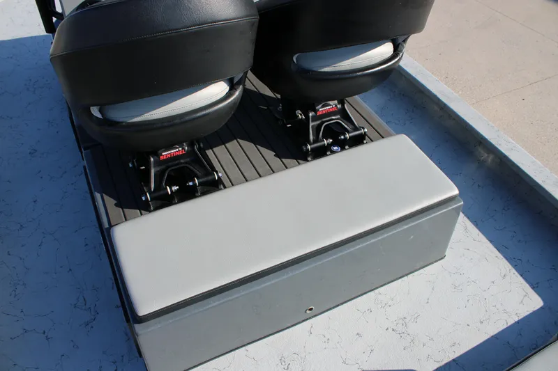 Slide: The Image of 2025 Mamba 23 Cat Classic boat seating with black and gray upholstery. - 17