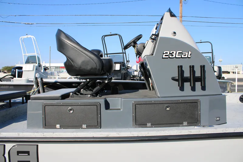 Slide: The Image of 2025 Mamba 23 Cat Classic boat with seating and storage compartments. - 20