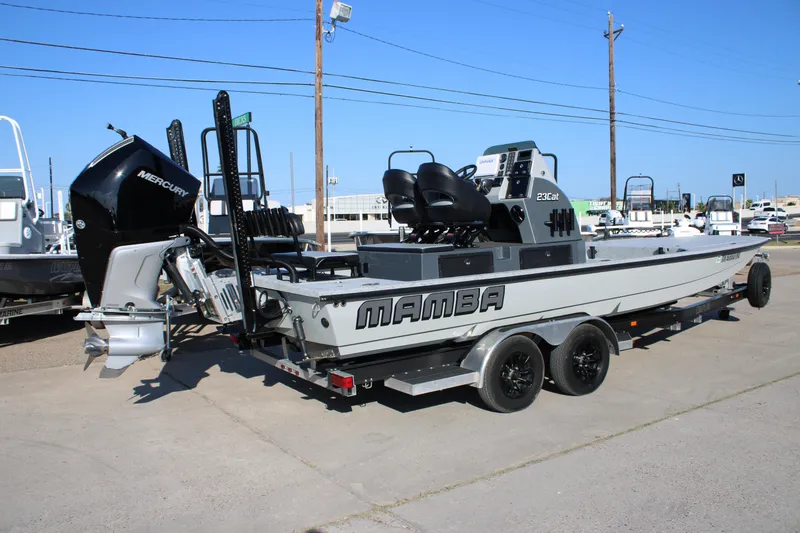 Slide: The Image of 2025 Mamba 23 Cat Classic boat on trailer, featuring a powerful Mercury engine. - 5